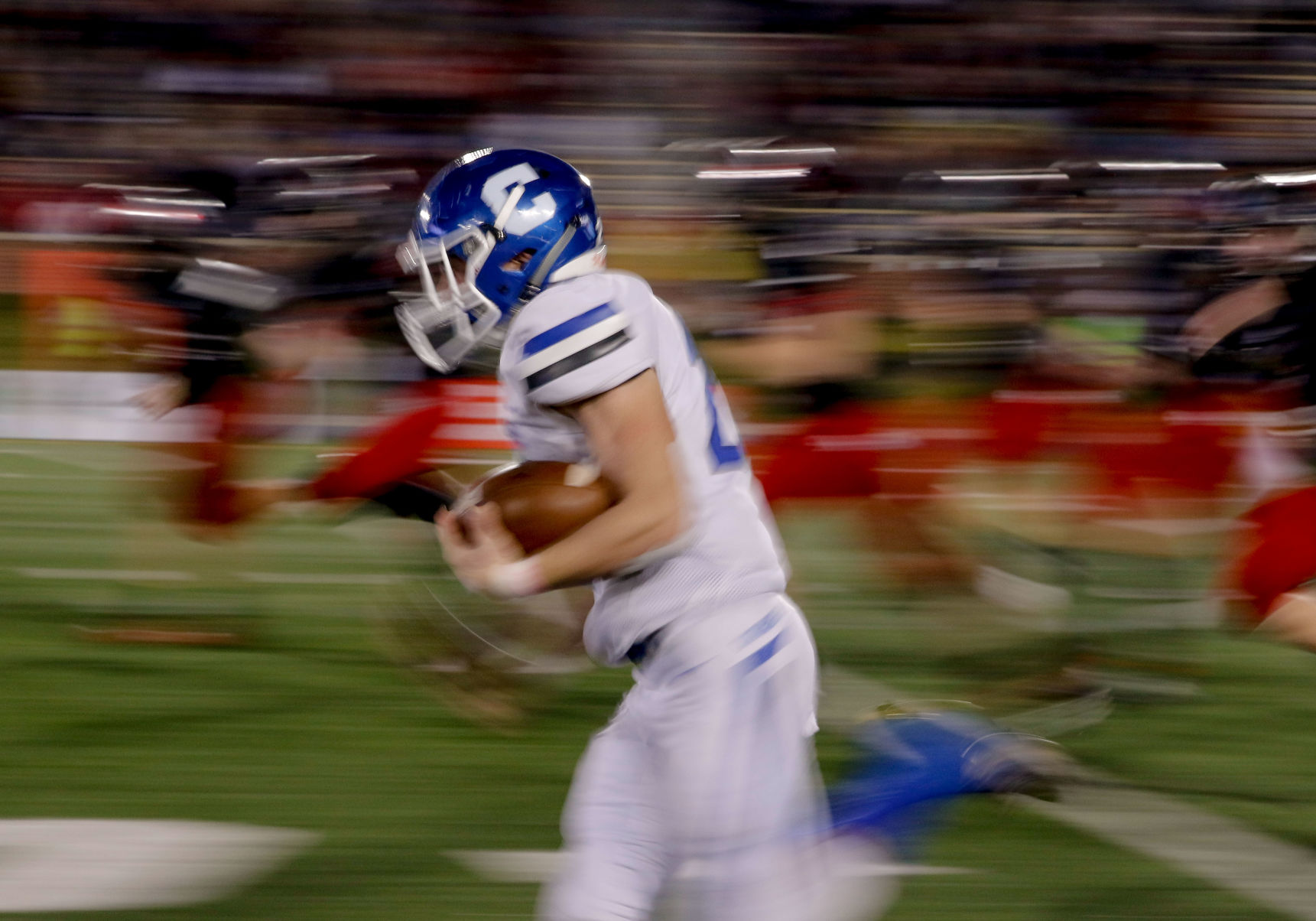 In this long exposure, Carthage's Tyler Mueller runs